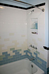 Bathtub tile surround with alcove.